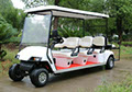 DMF White Golf Cart - 6 passenger with fold down seats (+2 passenger)  and stock tires and rims.